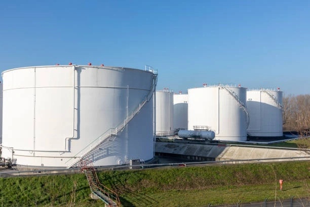White bulk storage tanks at an energy terminal