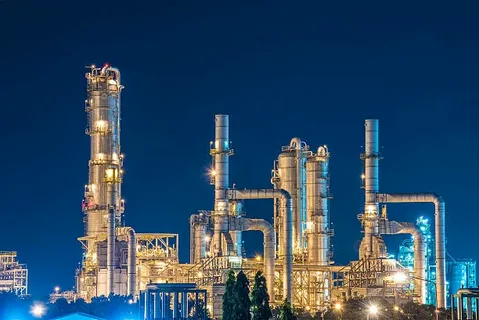 Energy terminal at dusk with storage tanks